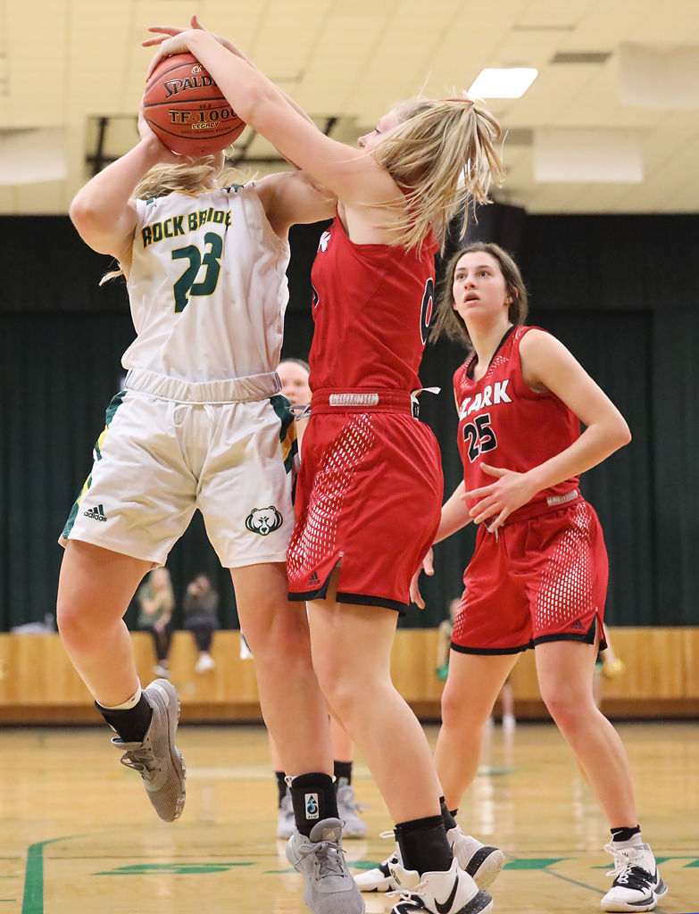 Eryn Puett gets blocked by Katie Mayes